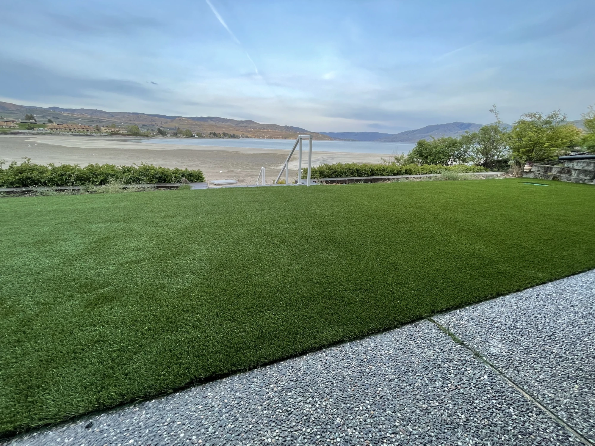 Grass backyard overlooking lake chelan