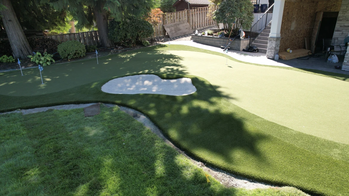 Custom putting green installation in Bellevue residential property