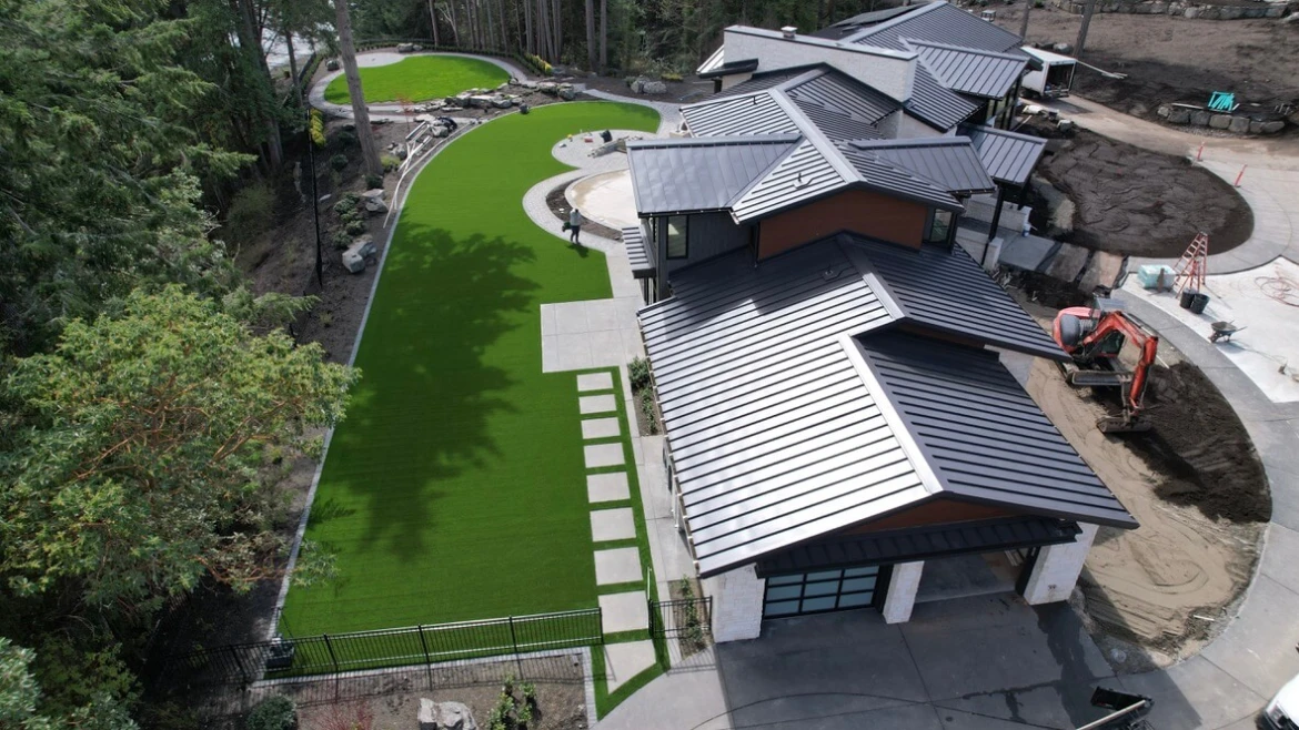 Aerial view of large-scale artificial turf installation in Gig Harbor showing invisible professional seam work