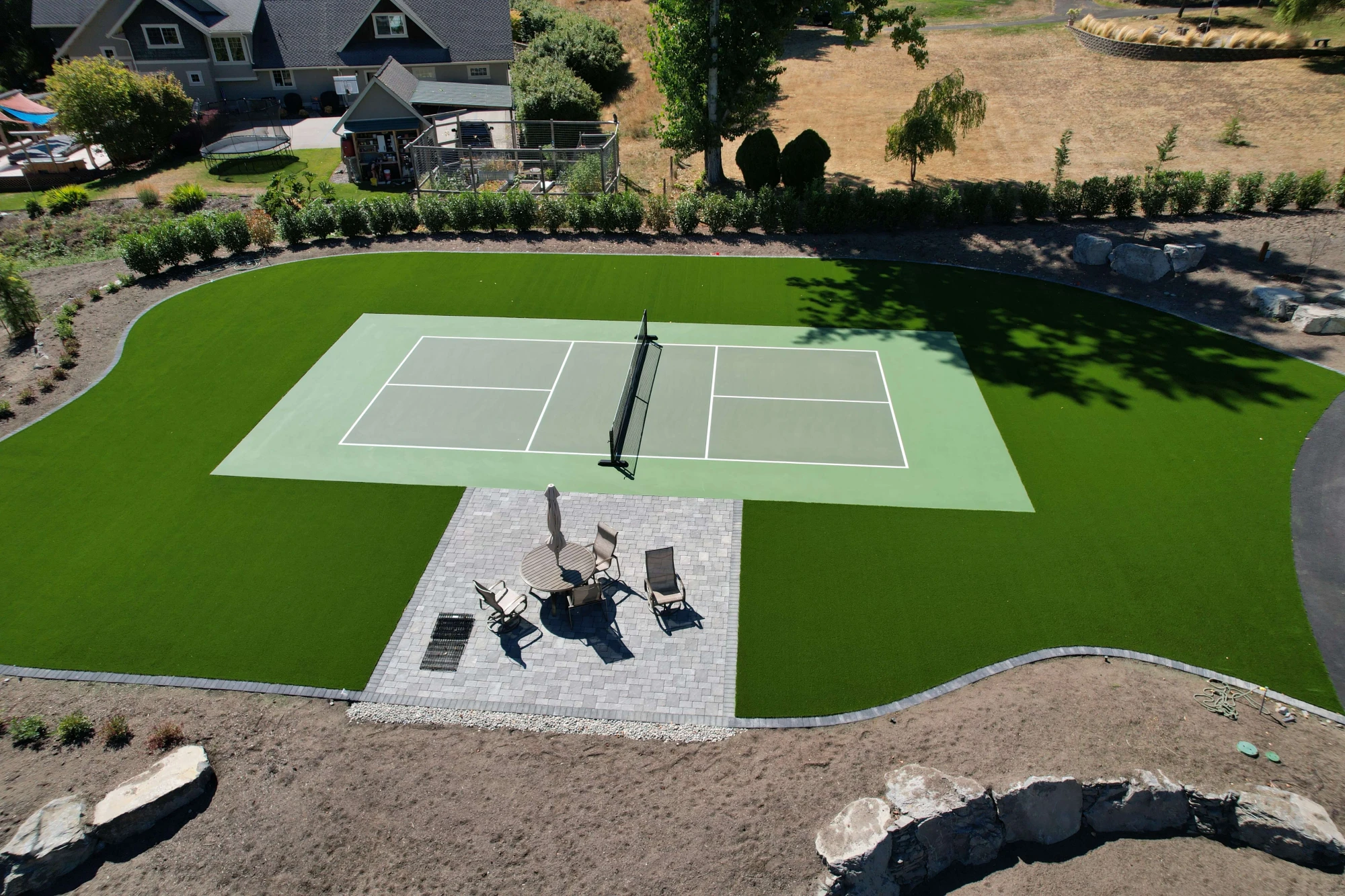 Synthetic Turf installation around pickleball court in Northwest Washington.