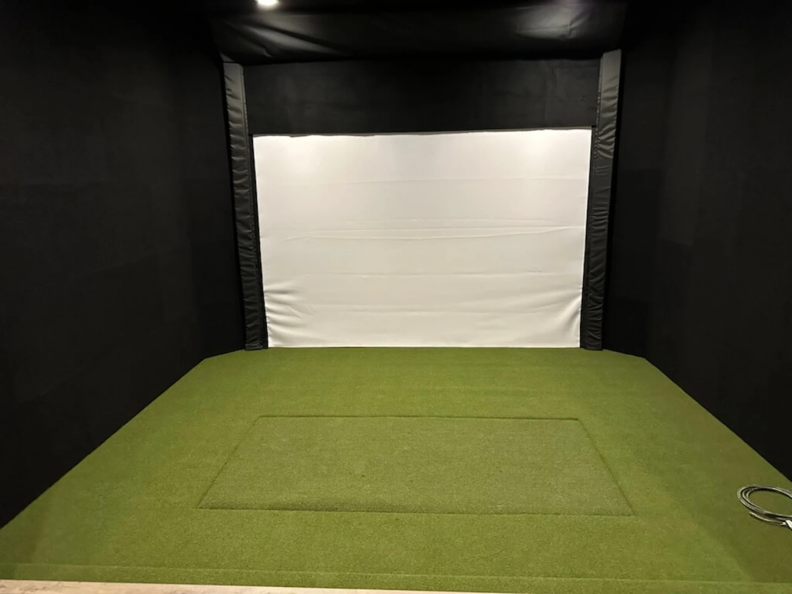 Indoor golf simulator synthetic turf installation using NP50 also known as Money Putt